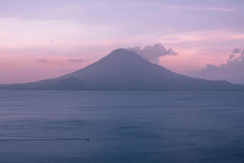 Lake Atitlan and volcano at dusk in Guatemala